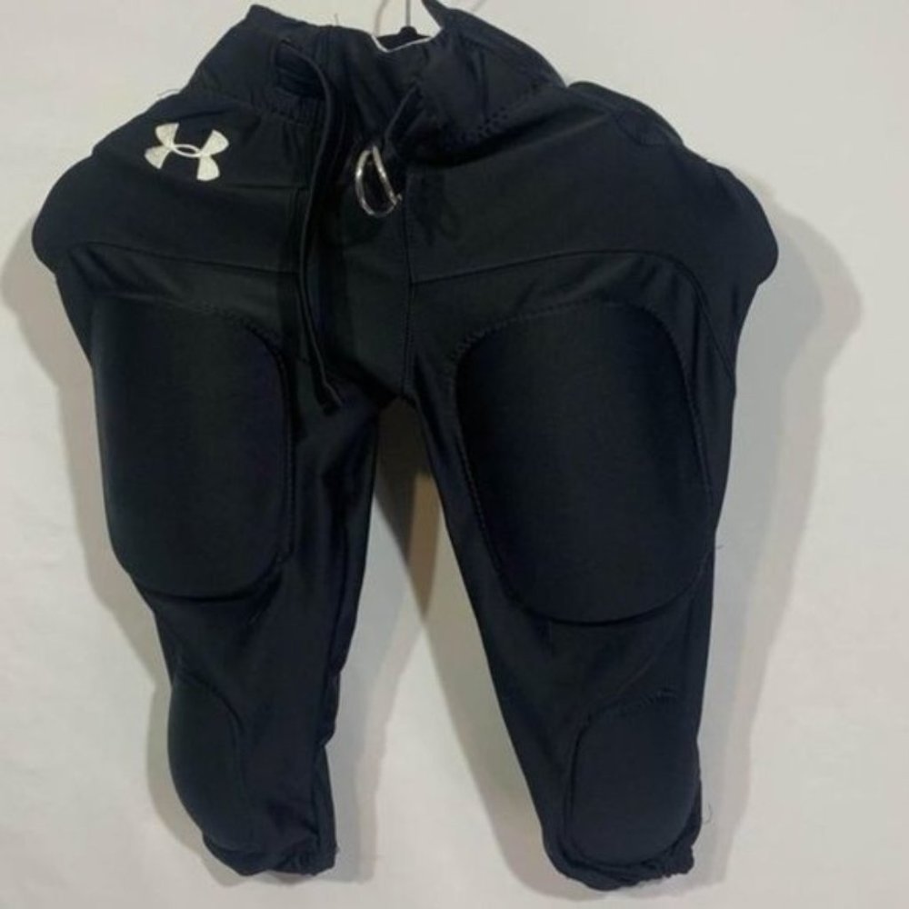 Under Armour boys football pants. Youth Large. Black. New condition. Padded.